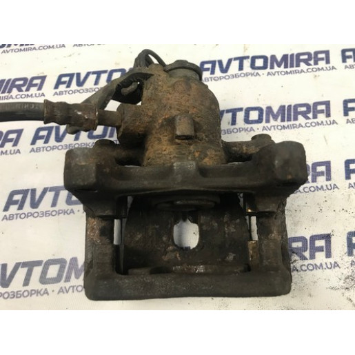 Супорт гальмівний задній правий Ford Mondeo 4 2007-2014 1738987